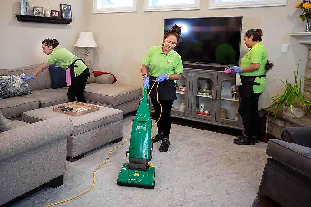 Living room fixtures are wiped clean | Helping Hands Cleaning Services