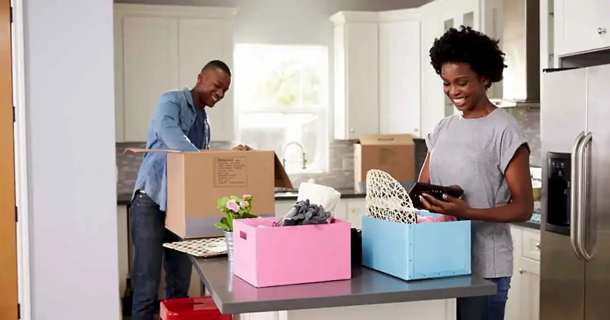 moving-to-naperville-move-in-clean-sets-tone-fresh-start Homeowners unpack into their new home after professional move-in cleaning in Naperville